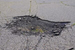 repair damaged asphalt pavement Annapolis Maryland